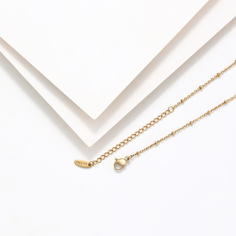 Collar Elegante con Medalla Milagrosa en Tono Dorado y Cruz Simple