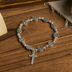 Medalla de Nuestra Señora Símbolo Sagrado Cruz Metal Pulsera: Un Token de Devoción