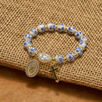 Medalla de Nuestra Señora y Pulsera Floral Inspirada: La Fe se Encuentra con el Estilo