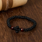 Pulsera de Cuerda con Nudo y Cruz Azul y Negra: Un Símbolo de Fe