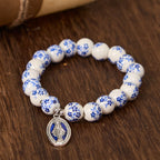 Pulsera Floral de Perlas Azules y Blancas con Medalla Milagrosa
