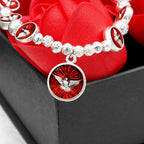 Pulsera de Esmalte del Espíritu Santo con Cruz y Cuentas de Rosa: Símbolo Apreciado de Protección Bendita