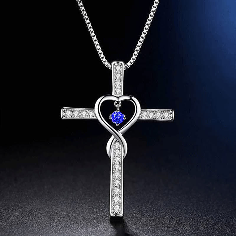 Collar de Cruz con Piedra de Nacimiento de 12 Meses y Diseño de Corazón con Acentos Brillantes