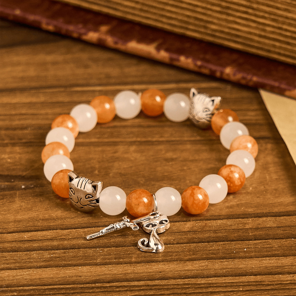 Pulsera de Cuarzo Naranja y Blanco con Caras de Gato, Rosario Animal de Acero Inoxidable