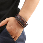 Pulsera de Cuero Trenzado con Cruz: Declaración de Fe Robusta para la Devoción Diaria