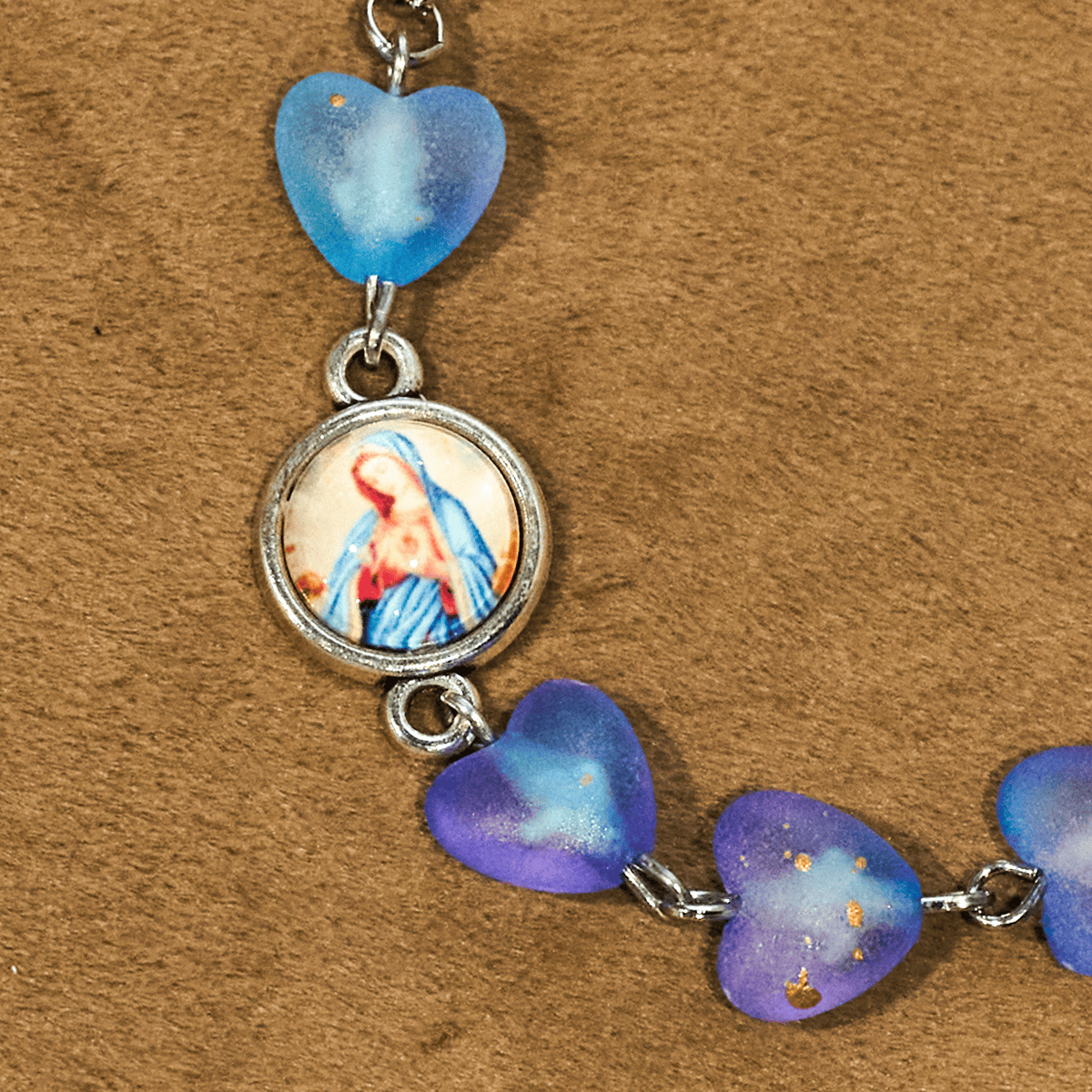 Rosario y Pulsera de Corazón Azul y Mariposa: Devoción y Espiritualidad Artística