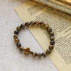 Pulsera Estilo Rosario de Ojo de Tigre: Piedra de Toque para la Reflexión