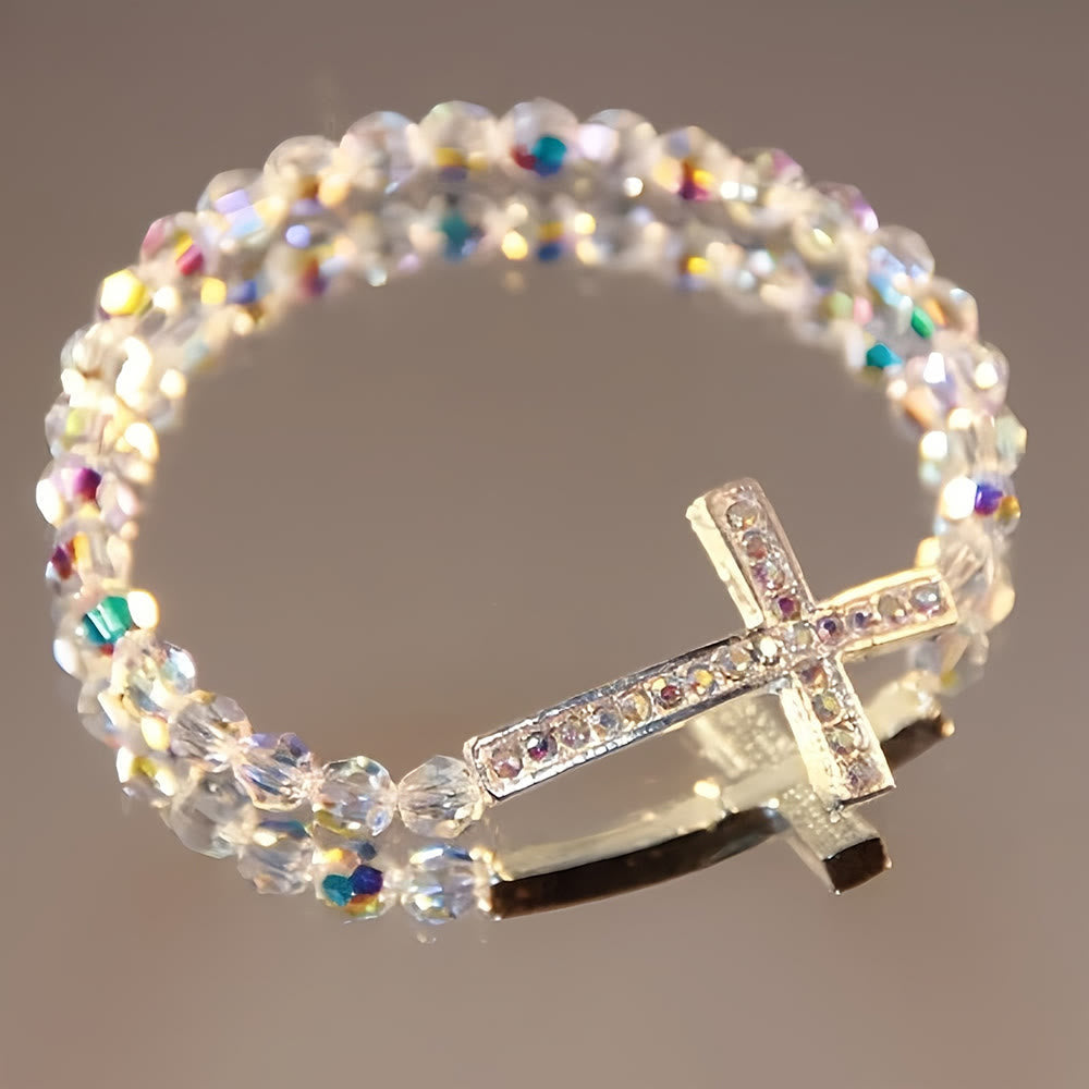 Pulsera Cruz Blanca y Azul Pavo Real: Creencia Envuelta en Brillo