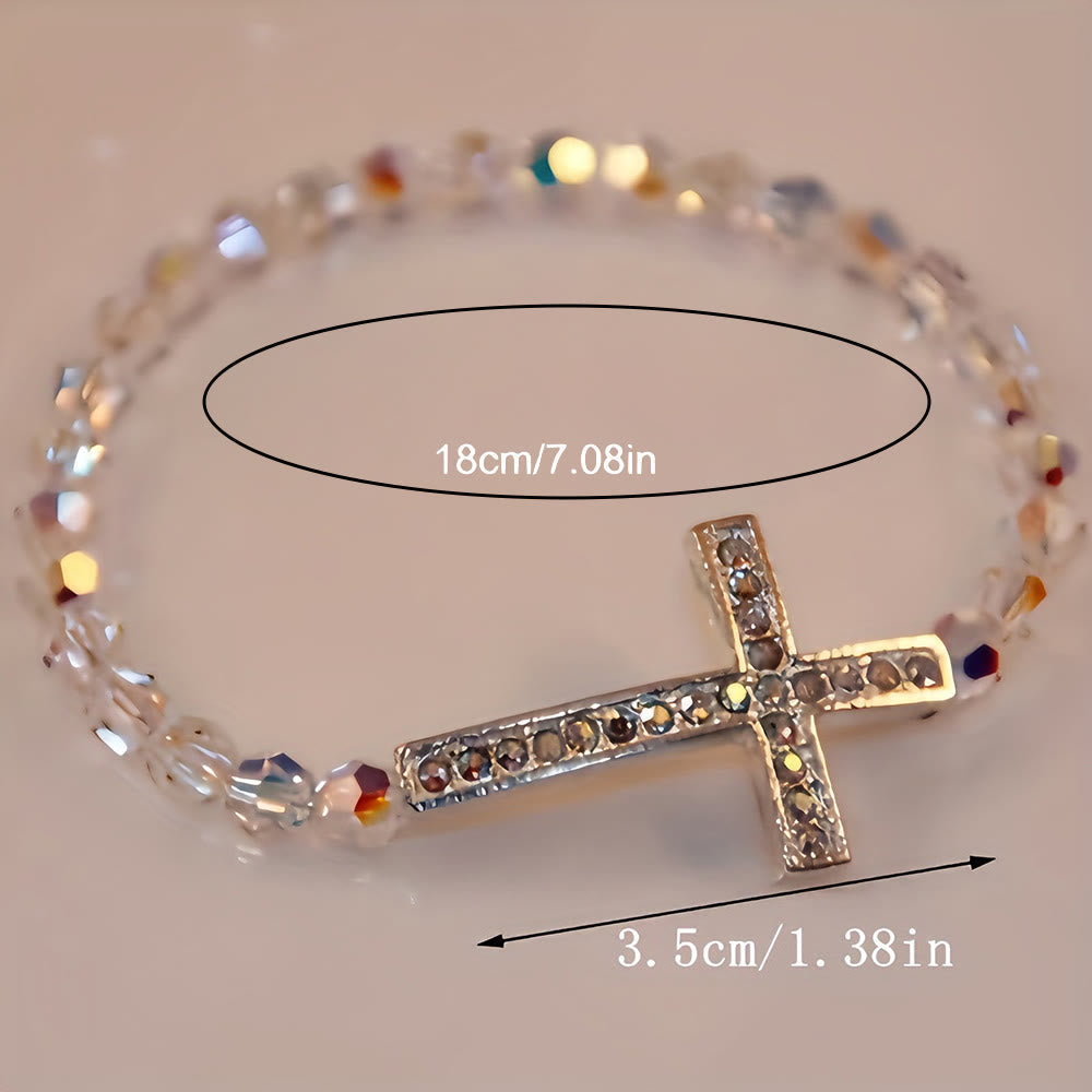 Pulsera Cruz Blanca y Azul Pavo Real: Creencia Envuelta en Brillo
