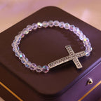 Pulsera Cruz Blanca y Azul Pavo Real: Creencia Envuelta en Brillo
