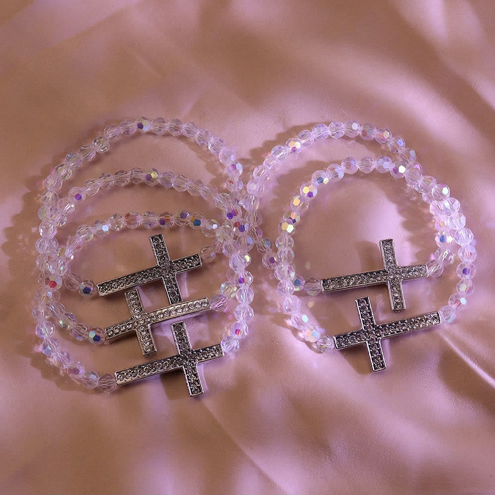 Pulsera Cruz Blanca y Azul Pavo Real: Creencia Envuelta en Brillo