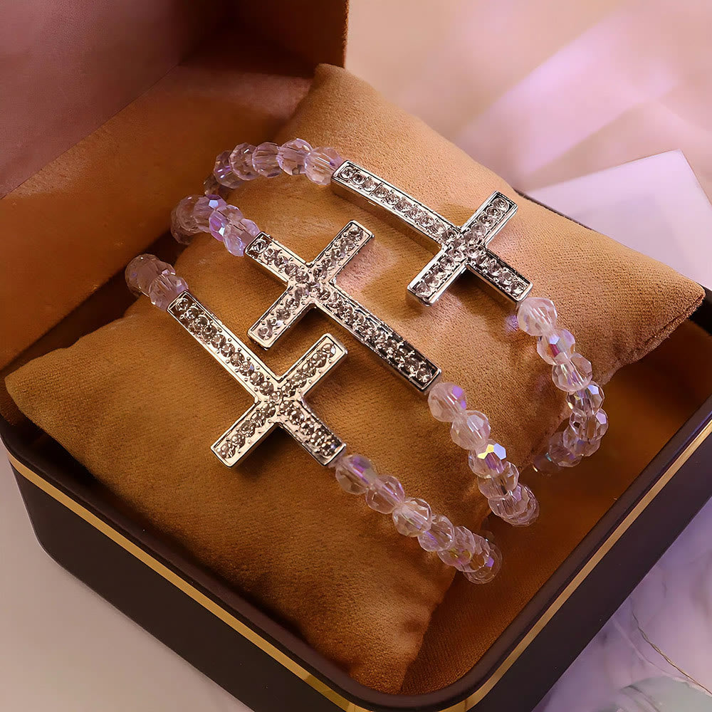 Pulsera Cruz Blanca y Azul Pavo Real: Creencia Envuelta en Brillo