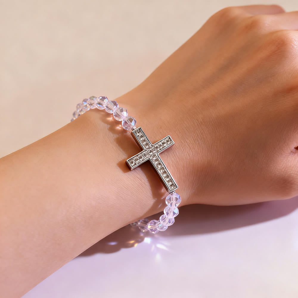 Pulsera Cruz Blanca y Azul Pavo Real: Creencia Envuelta en Brillo