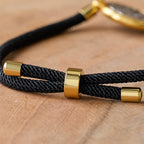Pulsera Ajustable de Cuerda Negra con Medalla de San Benito