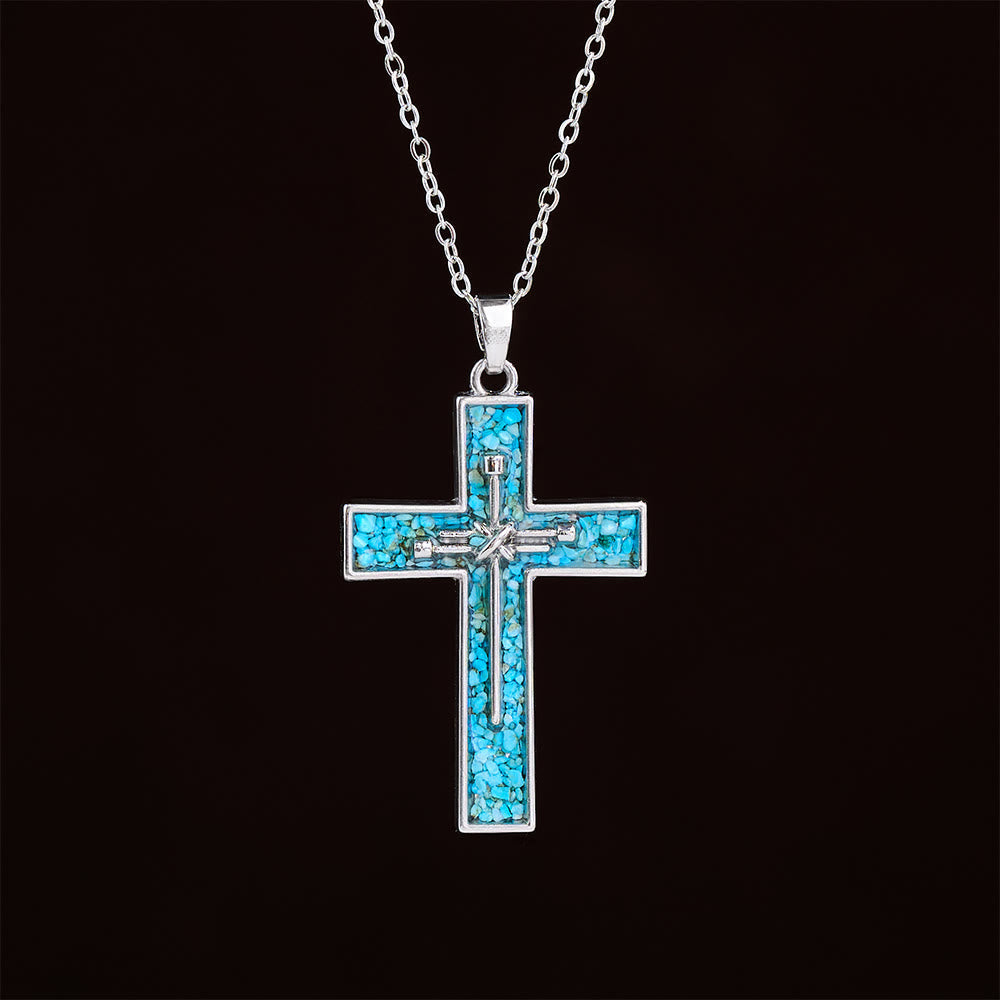 Collar de Cruz de Clavo con Incrustaciones de Turquesa: Un Símbolo del Amor Sacrificial de Cristo