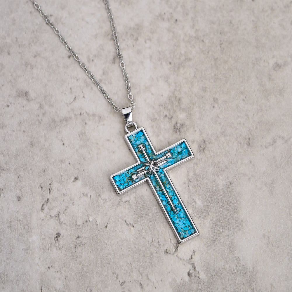 Collar de Cruz de Clavo con Incrustaciones de Turquesa: Un Símbolo del Amor Sacrificial de Cristo