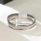 Pulsera de Cuero con Cruz BENDITA de Múltiples Capas y Circonitas: Un Símbolo de Gracia Divina y Alegría Espiritual