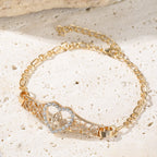 Pulsera de Filigrana Dorada de Nuestra Señora con Halo de Circonio: Un Símbolo de Devoción Mariana y Gracia Divina