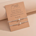 Pulsera de cuentas con cruz intrincada: Tejida con fe, gracia y amor inquebrantable