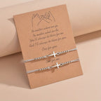 Pulsera de cuentas con cruz intrincada: Tejida con fe, gracia y amor inquebrantable