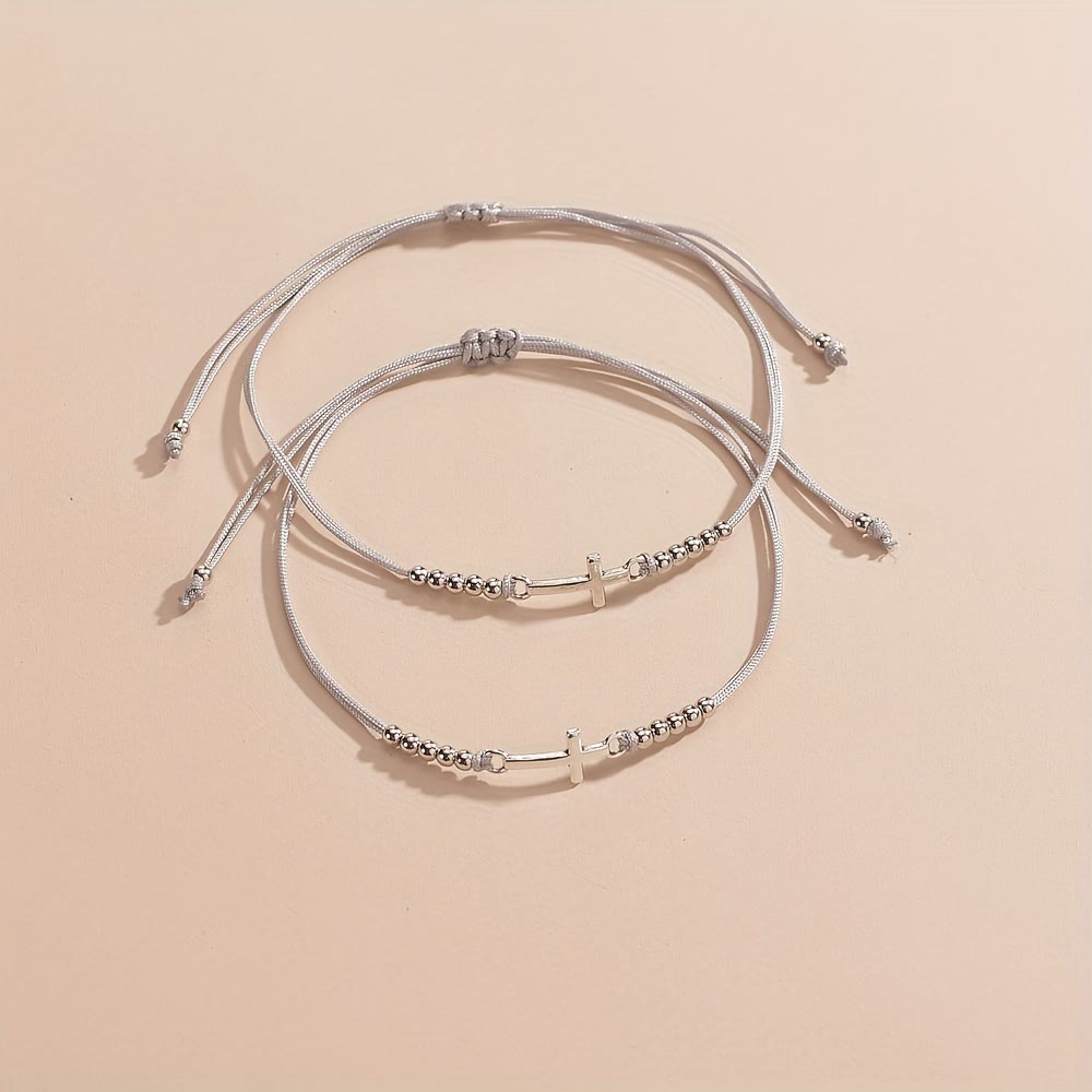 Pulsera de cuentas con cruz intrincada: Tejida con fe, gracia y amor inquebrantable