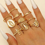 Conjunto de Anillos Cruz Marian Oro y Plata: Un Símbolo de Devoción Celestial