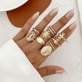 Conjunto de Anillos Cruz Marian Oro y Plata: Un Símbolo de Devoción Celestial